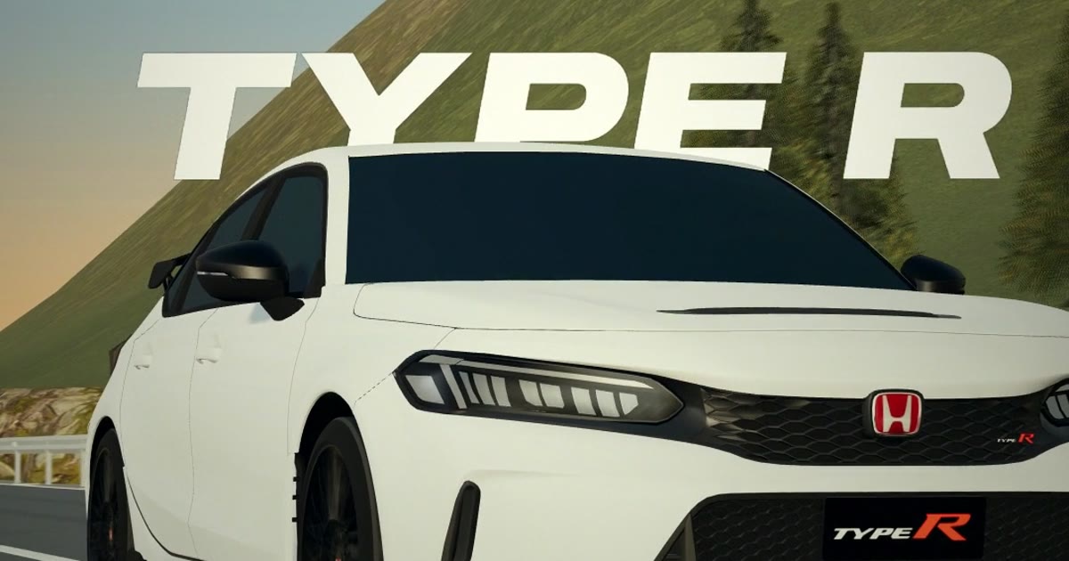 A white Honda Civic Type R in front of the words TYPE R