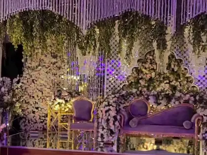 A purple and white floral stage